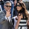 George Clooney et sa fiancée Amal Alamuddin (en Dolce & Gabbana) arrivent à Venise le 26 septembre 2014. Ils vont célébrer leur mariage !