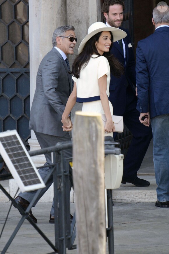 George Clooney et sa femme Amal Alamuddin quittant Venise, le 29 septembre 2014 après leur mariage civil
