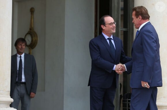 François Hollande et Arnold Schwarzenegger - Le président français reçoit en entretien M. Arnold Schwarzenegger, ancien gouverneur de l'Etat de Californie, fondateur et vice-président du réseau des régions pour le Climat "R 20", au palais de l'Elysée à Paris, le 10 octobre 2014.