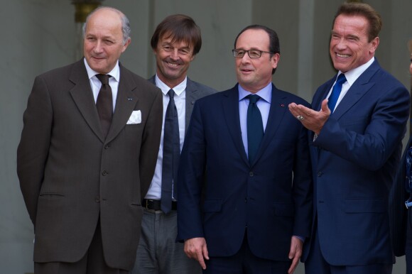 François Hollande aux côtés de Laurent Fabius, Nicolas Hulot et Arnold Schwarzenegger à Paris, le 10 octobre 2014.