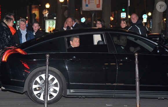 Nicolas Sarkozy à la sortie de l'Olympia après le concert de sa femme Carla Bruni à l'Olympia à Paris, le 11 mars 2014.