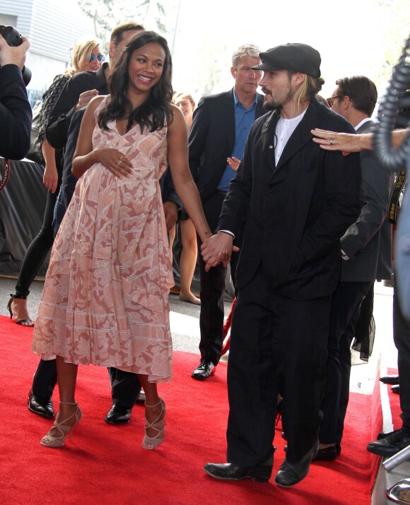 Zoe Saldana (enceinte) et son mari Marco Perego - Première du film "The Book of Life" à Los Angeles le 12 octobre 2014.