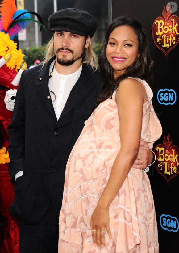 Zoe Saldana (enceinte) et son mari Marco Perego - Première du film "The Book of Life" à Los Angeles le 12 octobre 2014.