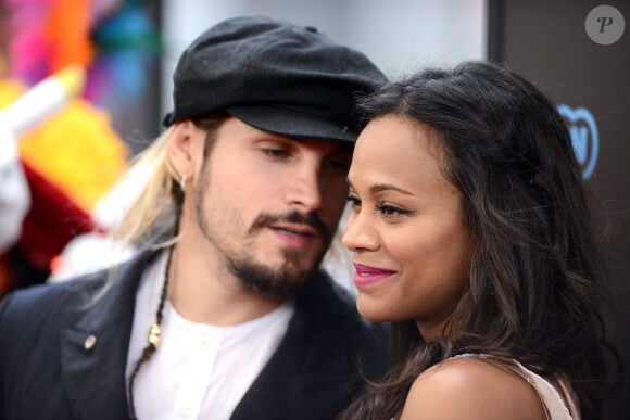 Zoe Saldana (enceinte) et son mari Marco Perego - Première du film "The Book of Life" à Los Angeles le 12 octobre 2014.