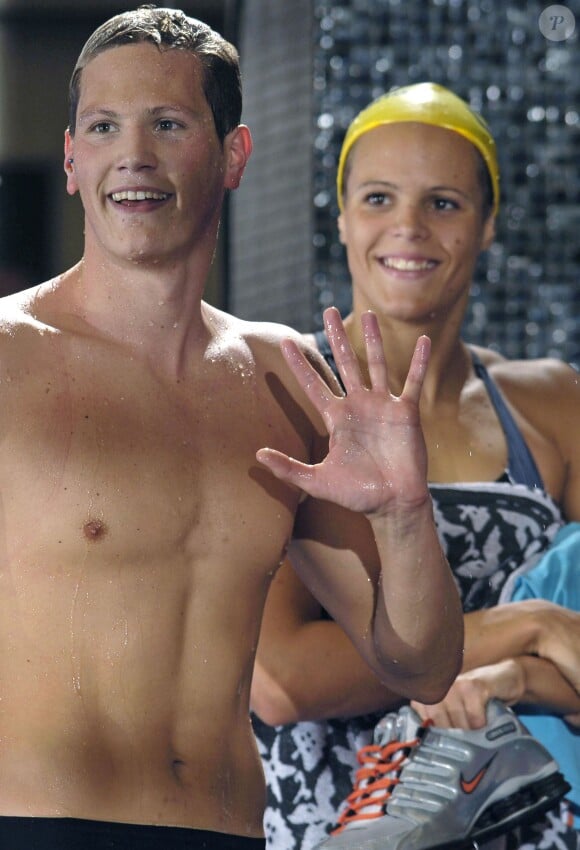 Laure Manaudou et son ex-compagnon Pierre Henri lors des championnats de France à Tours, le 11 mai 2006