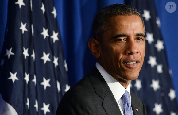 Le président Barack Obama lors d'une conférence à Washington sur la fraude bancaire le 17 octobre 2014. 