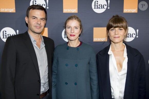 Francois Ozon, Karin Viard et Marina Fois lors de la soirée de vernissage de la FIAC 2014 organisée par ORANGE au Grand Palais à Paris, le 22 octobre 2014