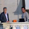 George Clooney et Jean Dujardin tournent la nouvelle publicité Nespresso à Cernobbio, le 27 août 2014. 