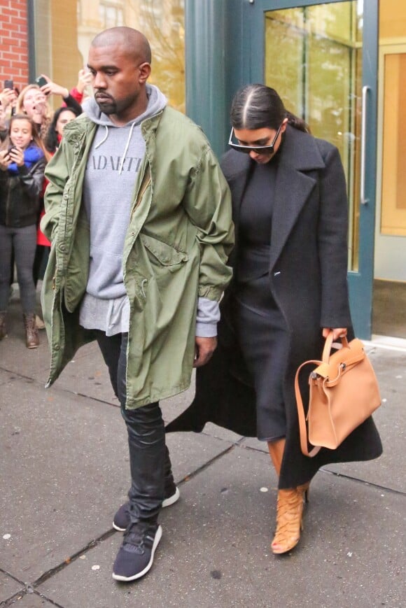Kanye West et Kim Kardashian quittent leur appartement dans le quartier de SoHo. New York, le 6 novembre 2014.