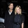 Alister Mackie et Kate Moss arrivent au Mark's Club pour assister à la soirée privée du magazine AnOther Man. Londres, le 20 novembre 2014.