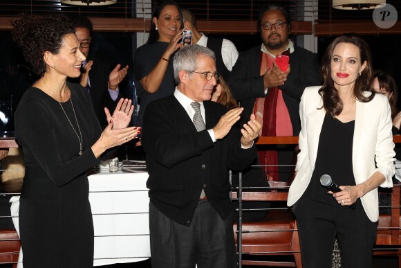 Donna Langley, Ron Meyer, Angelina Jolie lors d'une projection spéciale d'Invincible (Unbroken) à New York le 4 décembre 2014.