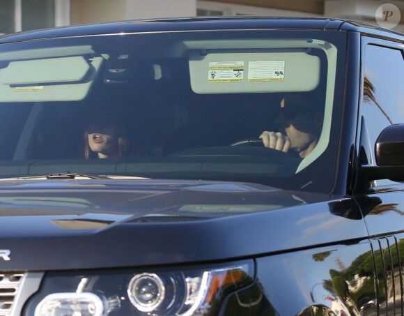 Exclusif - Megan Fox et son mari Brian Austin Green en voiture à Los Angeles, le 19 août 2014.