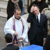 Julien Lepers, accompagné de son fils Guillaume Lepers, assiste aux obsèques de son papa Raymond Lepers, à la cathédrale d'Antibes, ainsi qu'à l'inhumation au cimetière de Rabiac, le 15 décembre 2014.