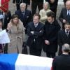 Julien Lepers, accompagné de son fils Guillaume Lepers, assiste aux obsèques de son papa Raymond Lepers, à la cathédrale d'Antibes, ainsi qu'à l'inhumation au cimetière de Rabiac, le 15 décembre 2014.