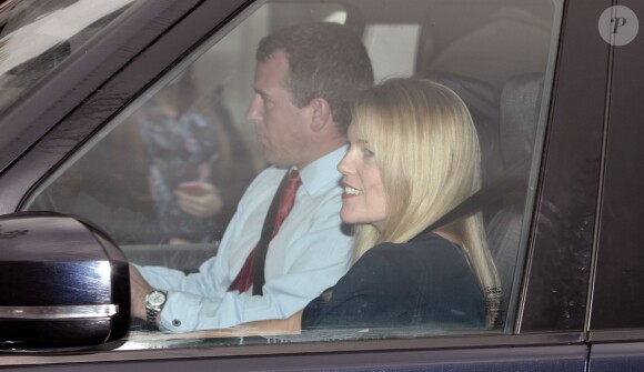 Peter Phillips et son épouse Autumn arrivant à Buckingham Palace le 17 décembre 2014 pour le traditionnel déjeuner de Noël offert par la reine Elizabeth II à la famille royale en préambule aux fêtes de fin d'année.