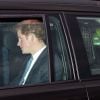Le prince Harry arrivant à Buckingham Palace le 17 décembre 2014 pour le traditionnel déjeuner de Noël offert par la reine Elizabeth II à la famille royale en préambule aux fêtes de fin d'année.