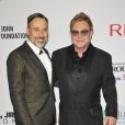 David Furnish et Elton John - People au gala AIDS Foundation à New York. Le 28 octobre 2014