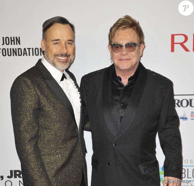 David Furnish et Elton John - People au gala AIDS Foundation à New York. Le 28 octobre 2014
