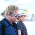 Exclusif - Elton John, son compagnon David Furnish et leurs fils Elijah et Zachary rentrent sur Nice après avoir passé la journée à Saint-Tropez, le 19 août 2014.