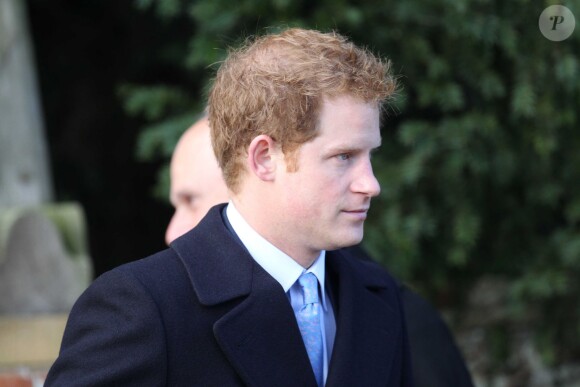 Le prince Harry accompagnée des membres de la famille royale anglaise assiste à la messe de Noël à Sandringham, le 25 décembre 2014.