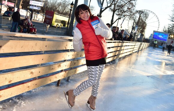 Sarah Abitbol anime une séance de Ice Fitness avec Stéphane Rotenberg sur la patinoire de Noël des Champs-Elysées à Paris, le 29 décembre 2014.29/12/2014 - Paris