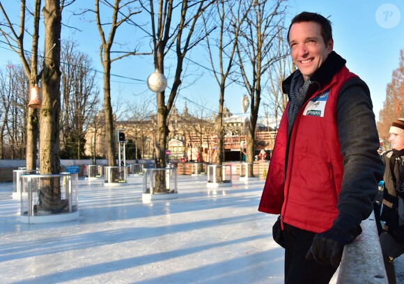 Stéphane Rotenberg anime une séance de Ice Fitness avec Sarah Abitbol sur la patinoire de Noël des Champs-Elysées à Paris, le 29 décembre 2014.29/12/2014 - Paris