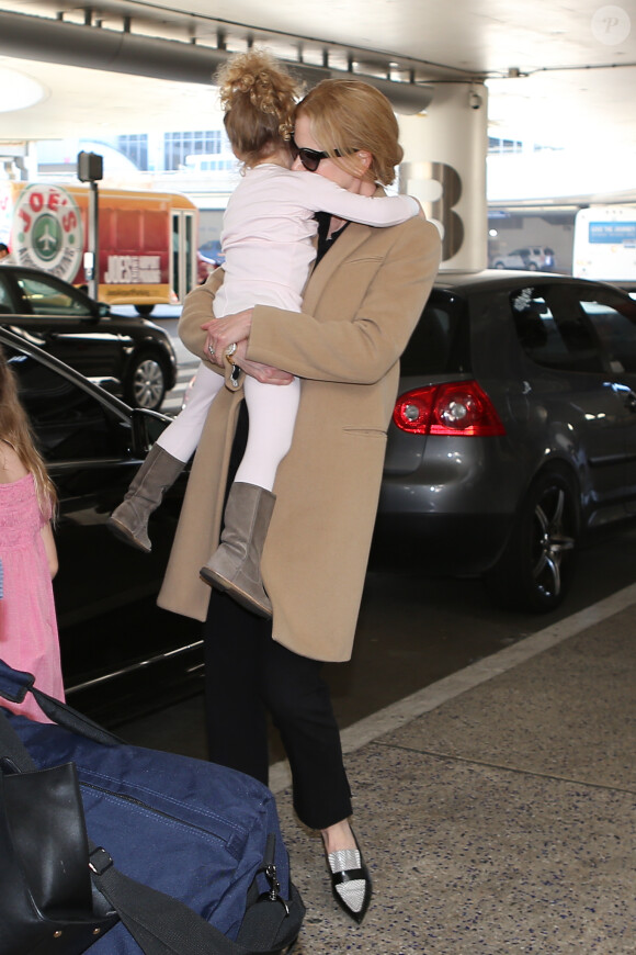 Nicole Kidman, son mari Keith Urban et leurs filles Sunday Rose et Faith arrivent à Los Angeles le 23 septembre 2014.  