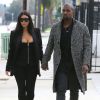 Kim Kardashian et son mari Kanye West, main dans la main, sortent des studios Milk puis se rendent au Cafe Primo, à West Hollywood, le 20 décembre 2014. 