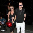 Jenny McCarthy et son fianc&eacute; Donnie Wahlberg arrivent &agrave; l'a&eacute;roport LAX de Los Angeles pour prendre un avion. Le 17 ao&ucirc;t 2014  