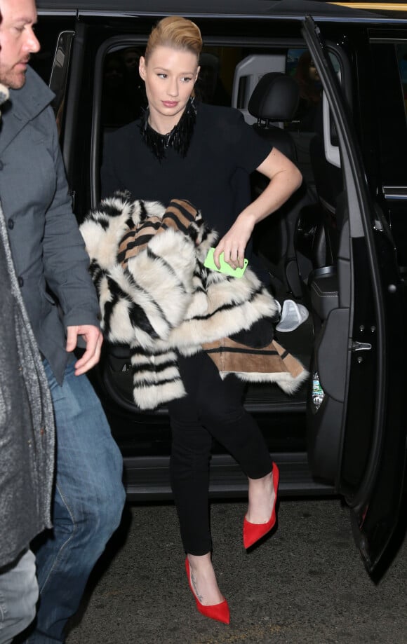 Iggy Azalea arrive aux "Billboard Women in Music Luncheon" à New York. Le 12 décembre 2014  