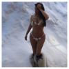 Kim Kardashian en bikini et bottes en fourrure lors de son week-end à Park City. Janvier 2015.