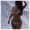 Kim Kardashian en bikini et bottes en fourrure lors de son week-end à Park City, dans l'Utah. Janvier 2015.