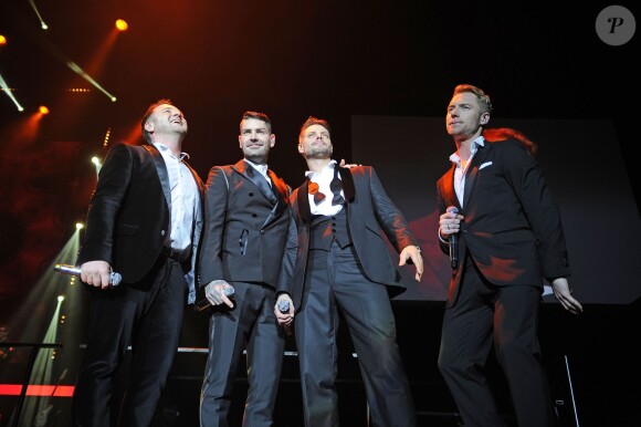 Mikey Graham, Shane Lynch, Keith Duffy, Ronan Keating - Le groupe Boyzone en concert au Wembley Arena a Londres, le 21 decembre 2013. 