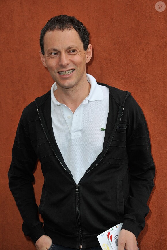 Marc-Olivier Fogiel au Village de Roland-Garros avant d'assister à la finale   le 9 juin 2013