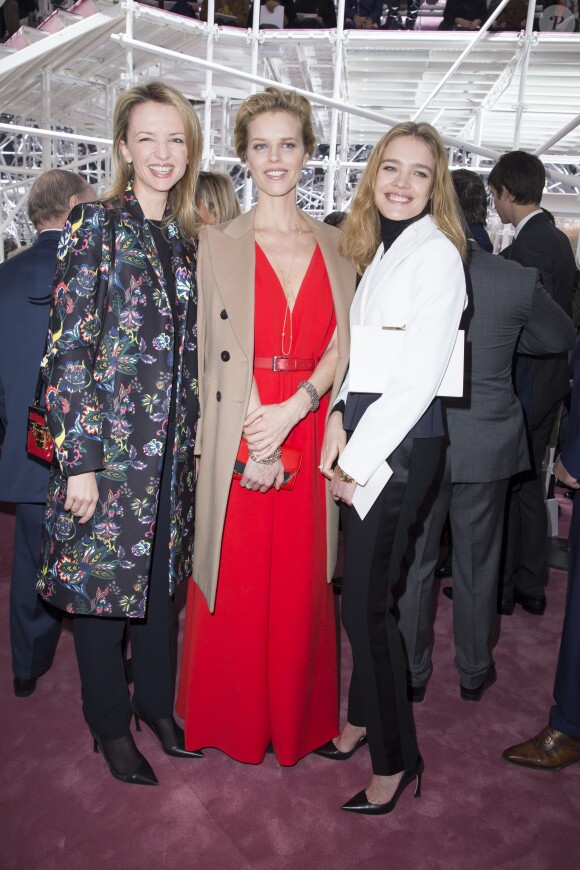 Delphine Arnault, Eva Herzigova et Natalia Vodianova assistent au défilé Christian Dior haute couture printemps-été 2015 au musée Rodin. Paris, le 26 janvier 2015.