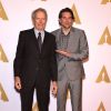 Clint Eastwood et Bradley Cooper - Photocall lors du déjeuner pour les nommés aux Oscars à l'hôtel Hilton à Los Angeles, le 2 février 2015.