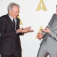 Clint Eastwood et Bradley Cooper lors du déjeuner pour les nommés aux Oscars à l'hôtel Hilton de Los Angeles, le 2 février 2015.