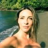 Eve Angeli topless à la Guadeloupe, le 6 février 2015.