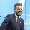 David Beckham, tout sourire à Londres au siège de Google le 9 février 2015 où il a annoncé la création d'un fond à son nom, le 7 : The David Beckham UNICEF Fund, pour venir en aide aux enfants en situation difficiles à travers le monde.