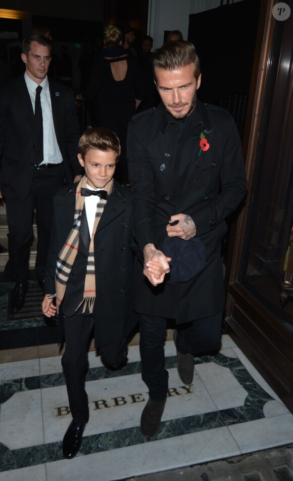 David Beckham et son fils fils Romeo à Londres, le 3 novembre 2014.