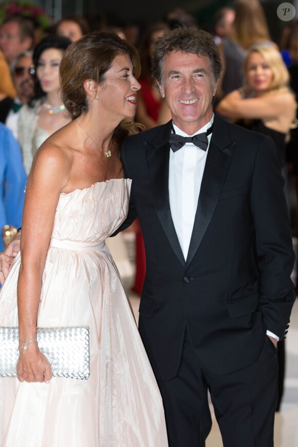 François Cluzet et sa femme Narjiss lors du 66ème Gala de la Croix Rouge Monégasque au Sporting de Monte-Carlo à Monaco, le 1er août 2014