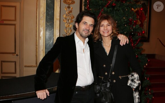 Bruno Madinier et Florence Pernel - 20e Prix du producteur francais de télévision" au Théâtre Mogador à Paris, le 9 décembre 2013.