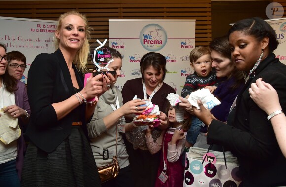 Élodie Gossuin marraine de l'association 'We Love Prema', qui décore des bodies pour les prématurés distribués dans les hopitaux lors d'une soirée organisée au Palais Brogniart à Paris le 6 février 2015.06/02/2015 - Paris