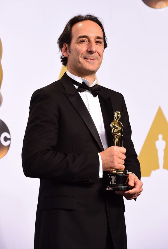 Alexandre Desplat with the Original Score Award for 'The Grand Budapest Hotel', in the press room of the 87th Academy Awards held at the Dolby Theatre in Hollywood, Los Angeles, CA, USA, February 22, 2015. Photo by Ian West/PA Wire/ABACAPRESS.COM23/02/2015 - Los Angeles