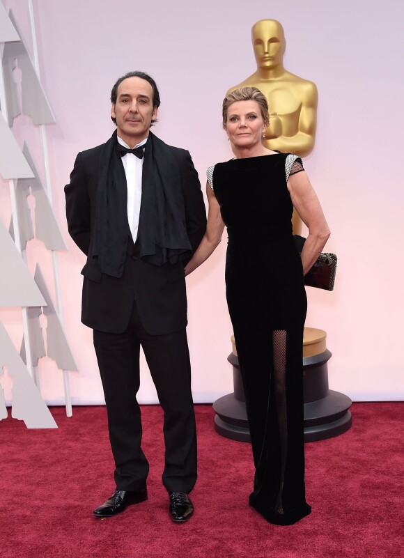 Alexandre Desplat et sa bien-aimée Dominique Lemonnier lors de la 87e cérémonie des Oscars à Los Angeles le 22 février 2015