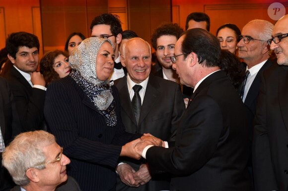 Latifa Ibn Ziaten, Alain Chouffan, Sacha Reingewirtz et François Hollande au 30e dîner annuel du Conseil représentatif des institutions juives de France (Crif) à l'Hôtel Pullman à Paris, le 23 février 2015.