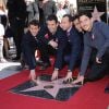 Le groupe New Kids on the Block composé de Donnie Wahlberg, Jordan Knight, Jonathan Knight, Joey McIntyre, et Danny Wood, reçoit son étoile sur le Walk Of Fame en compagnie d'Arsenio Hall à Hollywood, le 9 octobre 2014