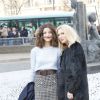 Esther Garrel et Camille Seydoux quittent le Conseil Économique et Social à l'issue du défilé Miu Miu automne-hiver 2015-2016. Paris, le 11 mars 2015.