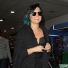 Demi Lovato arrive à l'aéroport de Heathrow à Londres, le 11 novembre 2014  