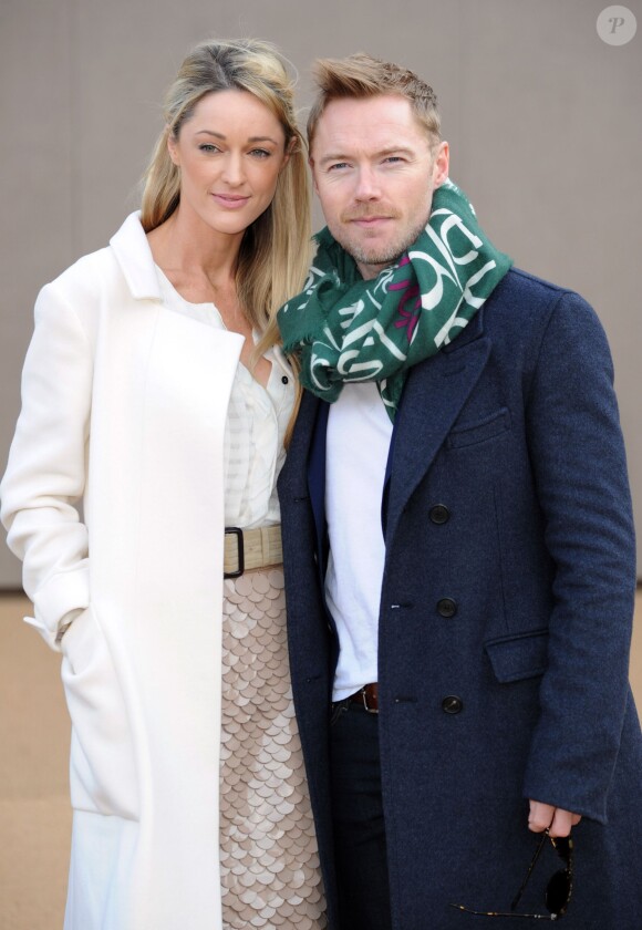 Ronan Keating and Storm Uechtriz arrive au défilé Automne/Hiver 2015 "Burberry Prorsum" à Kensington Gardens lors de Fashion Week à Londres, le 23 février 2015